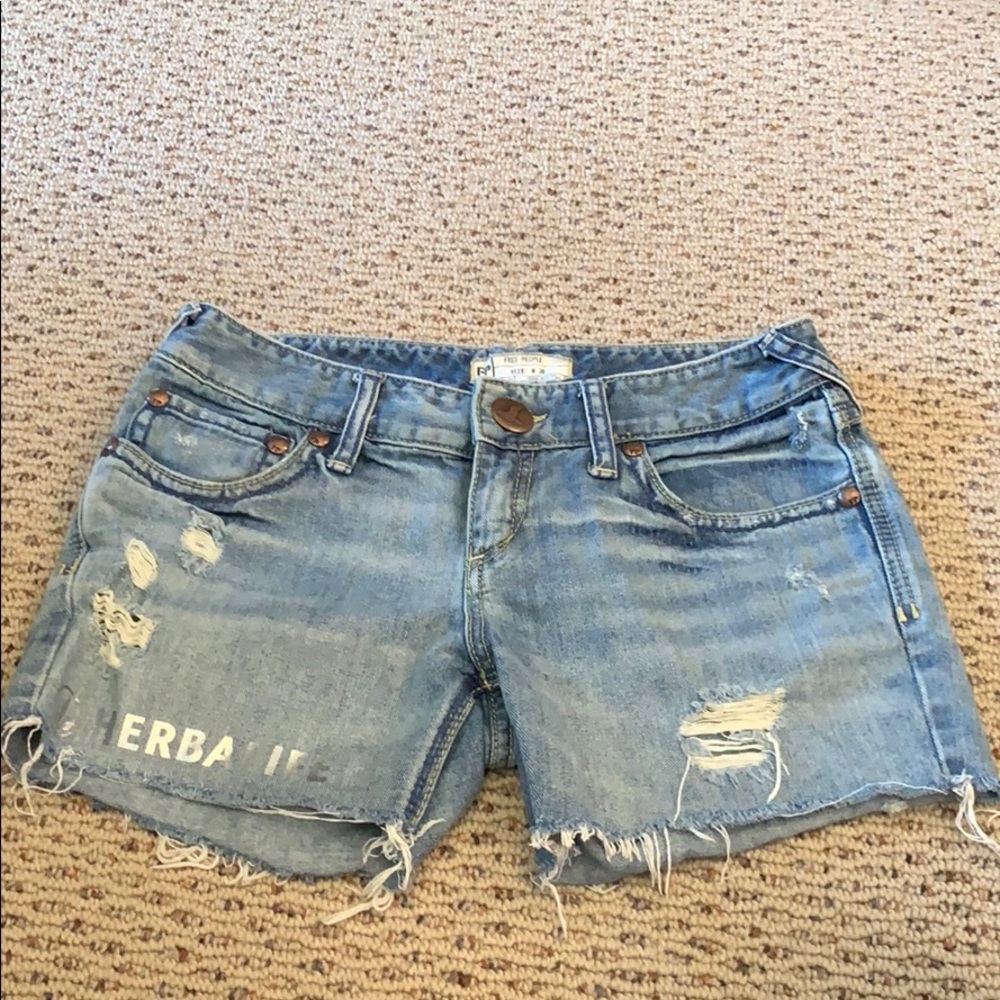 free people herbalife distressed jean shorts.